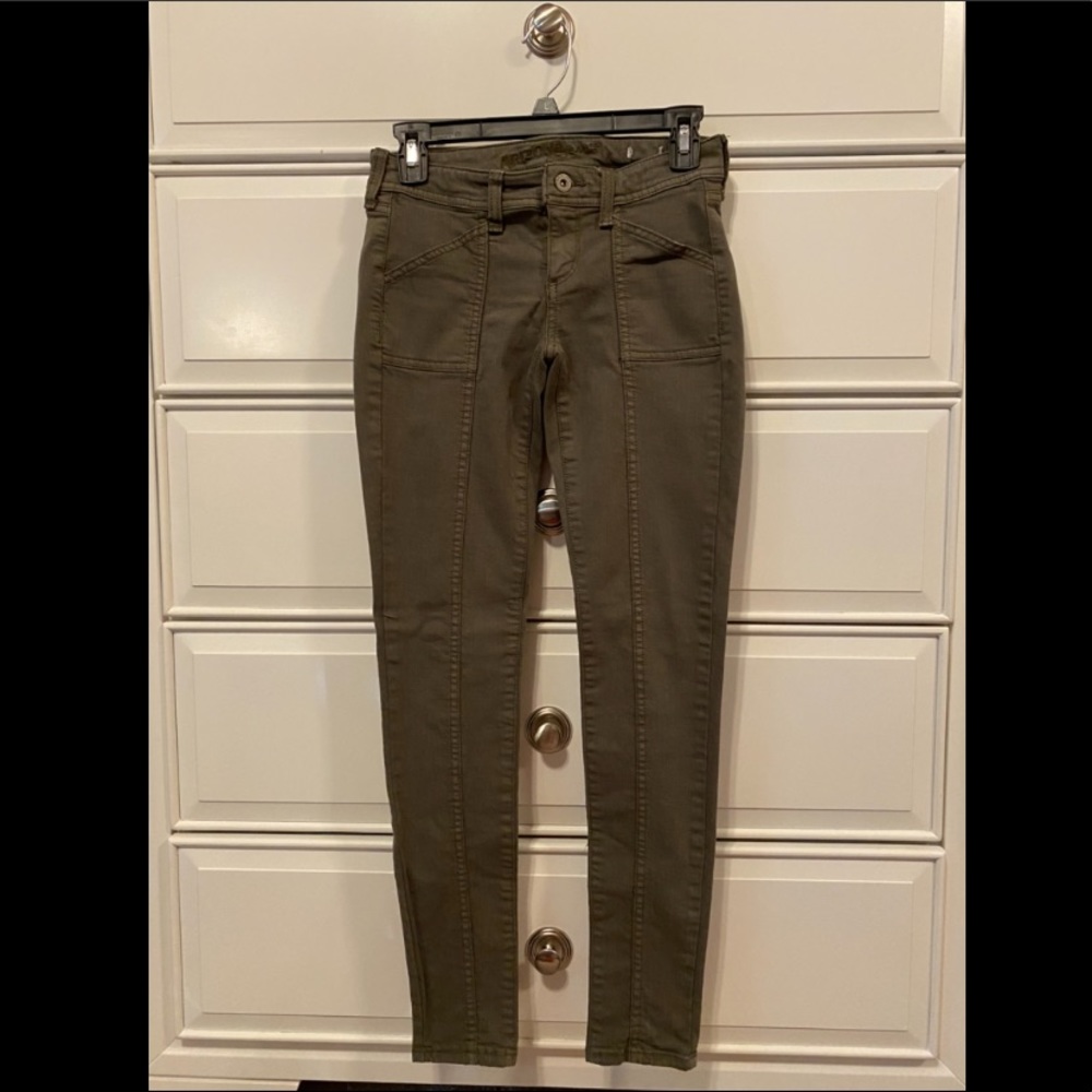 green skinny jeans